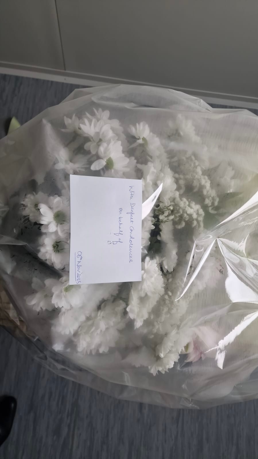 flowers on someone's deathbed