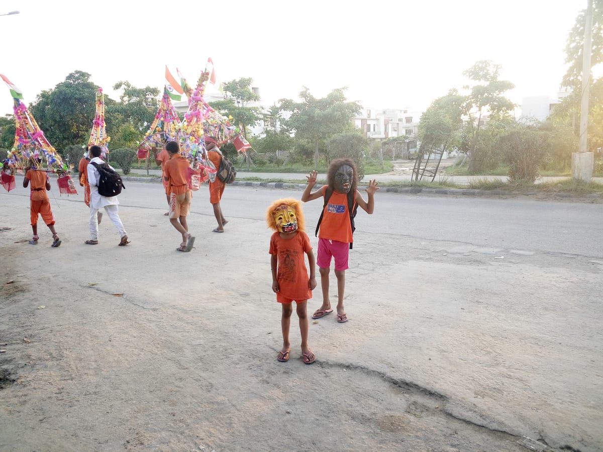 Picture of two children wearing masks